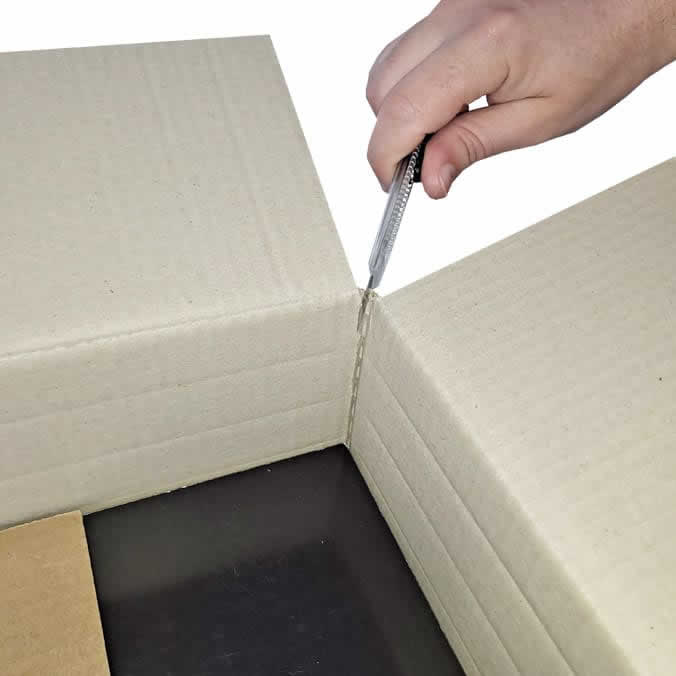 Cajas de cartón 350 x 255 x 230 mm. Altura variable.